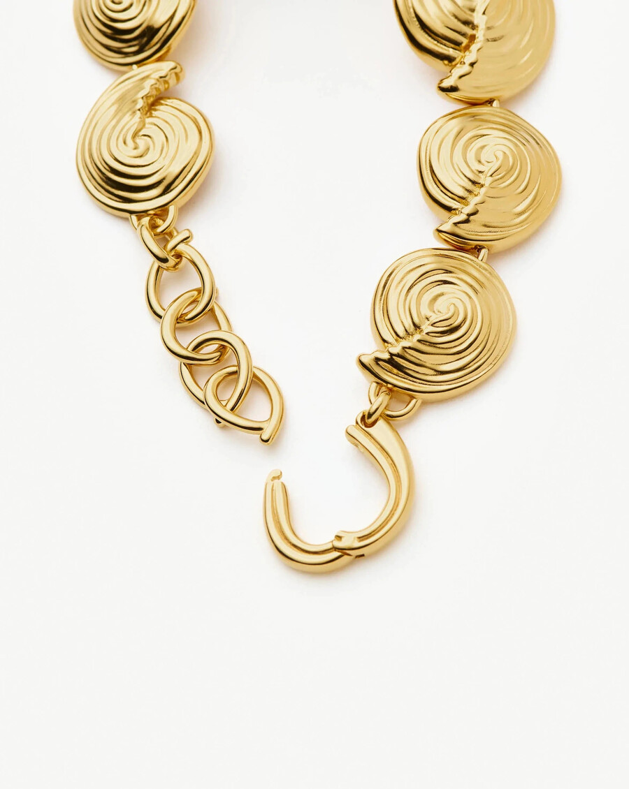 spiral-statement-armband mit kette – gold