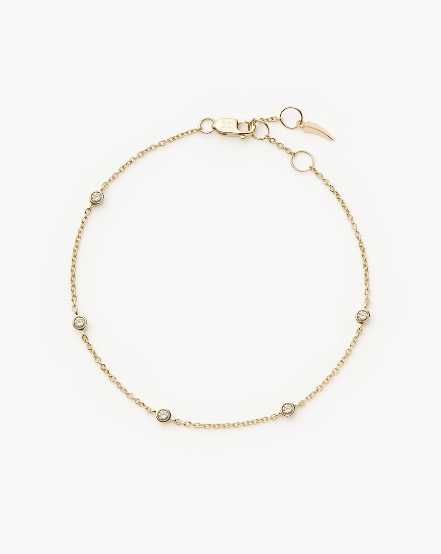 armband aus 14-karätigem massivgold mit schwebenden diamanten