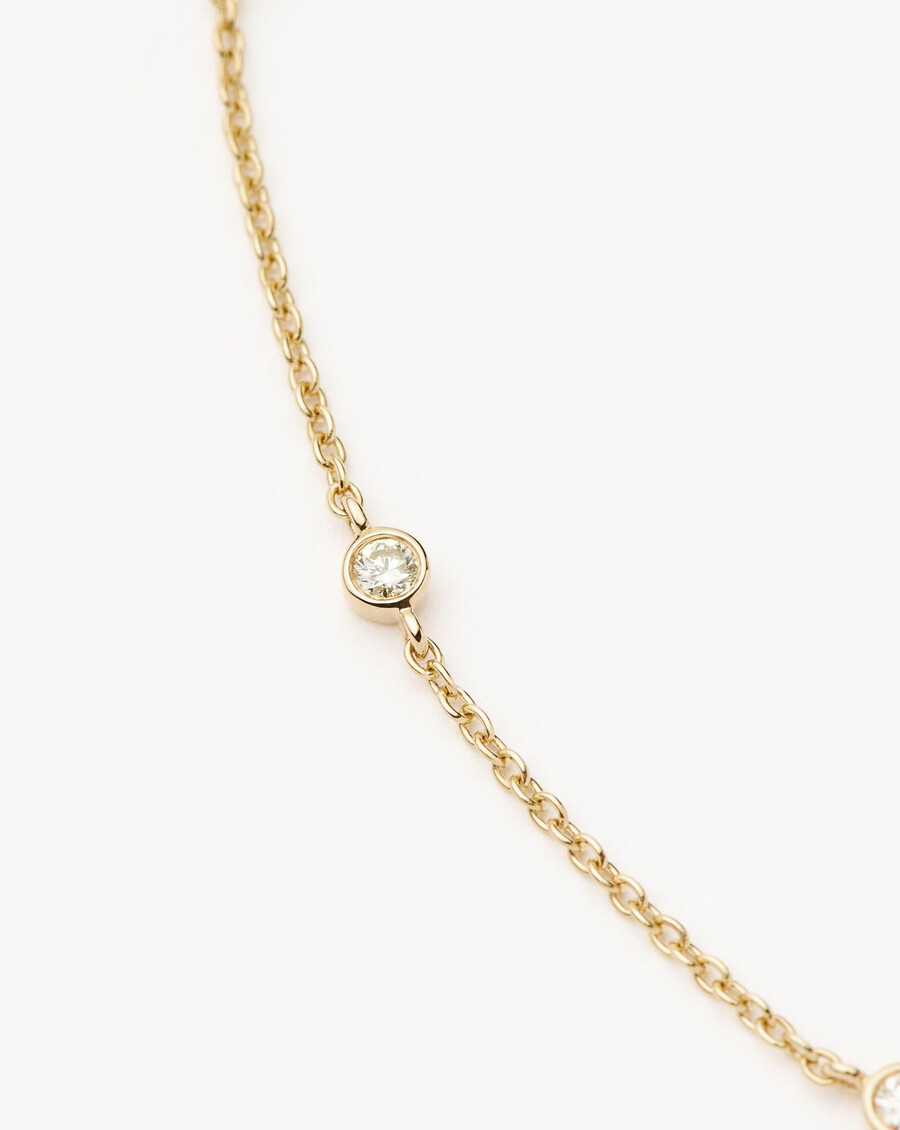 armband aus 14-karätigem massivgold mit schwebenden diamanten