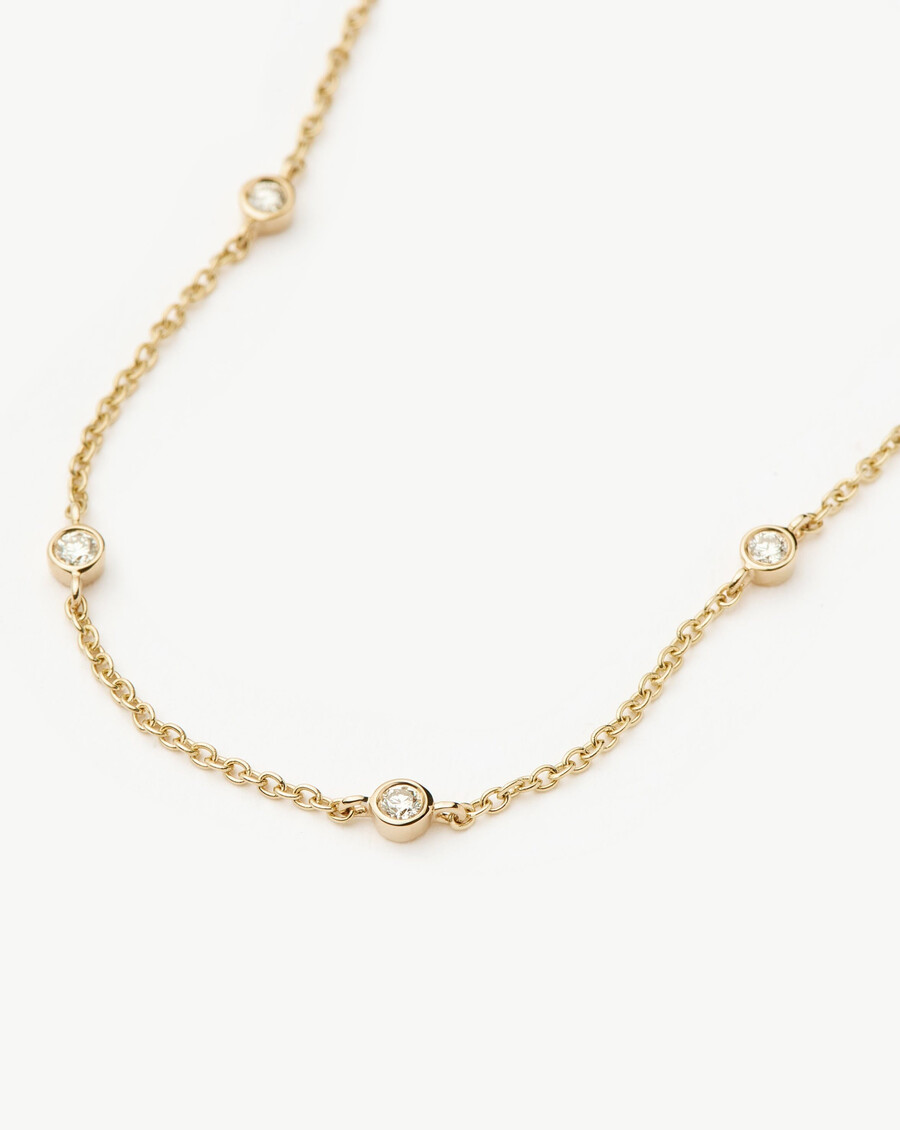 armband aus 14-karätigem massivgold mit schwebenden diamanten