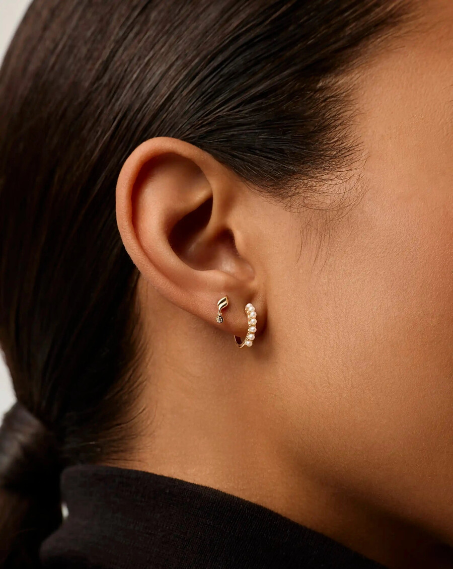 ohrstecker aus 14-karätigem massivgold mit einem einzelnen diamanten savi